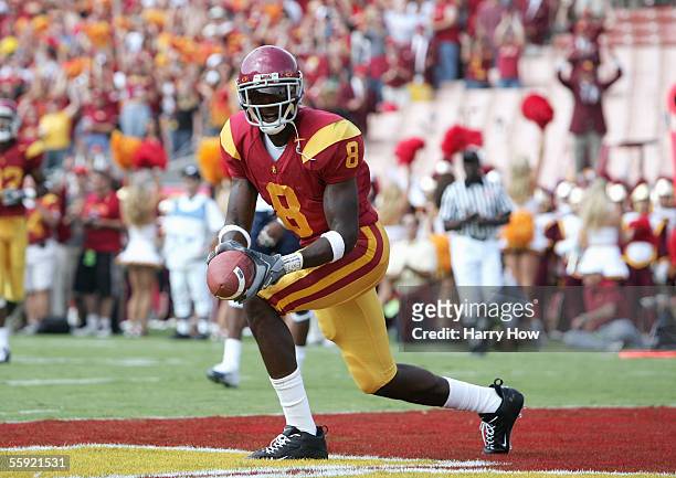 Dwayne Jarrett of the USC Trojans celebrates in the end zone during the game with the Arizona Wildcats at the Los Angeles Colliseum on October 8,...