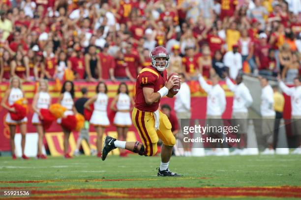 Matt Leinart of the USC Trojans looks to pass during the game with the Arizona Wildcats at the Los Angeles Colliseum on October 8, 2005 in Los...
