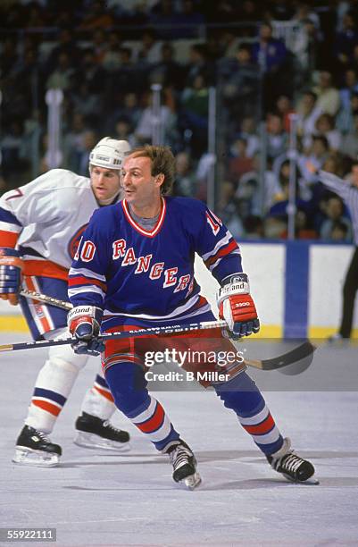 Guy Lafleur of the New York Rangers skates on the ice during a game against the New York Islanders at Nassau Coliseum in Uniondale, New York circa...