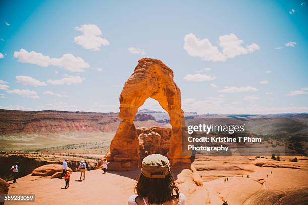 delicate life - delicate arch stock-fotos und bilder