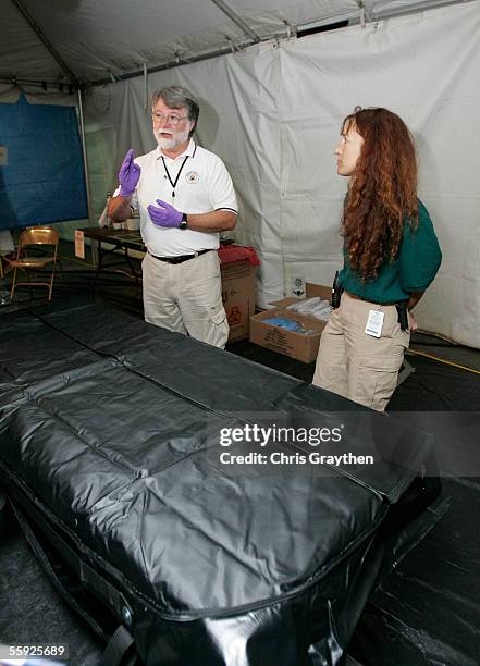 Louisiana State Medical Examiner Dr. Louis Cataldie explains the process by which the bodies of victims of Hurricane Katrina are placed back into the...