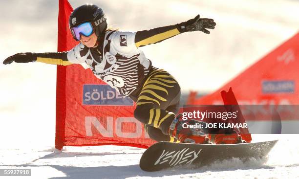 Amelie Kober of Germany competes in the women's parallel giant slalom during the opening of the snowboarding FIS World Cup in Soelden 15 October...