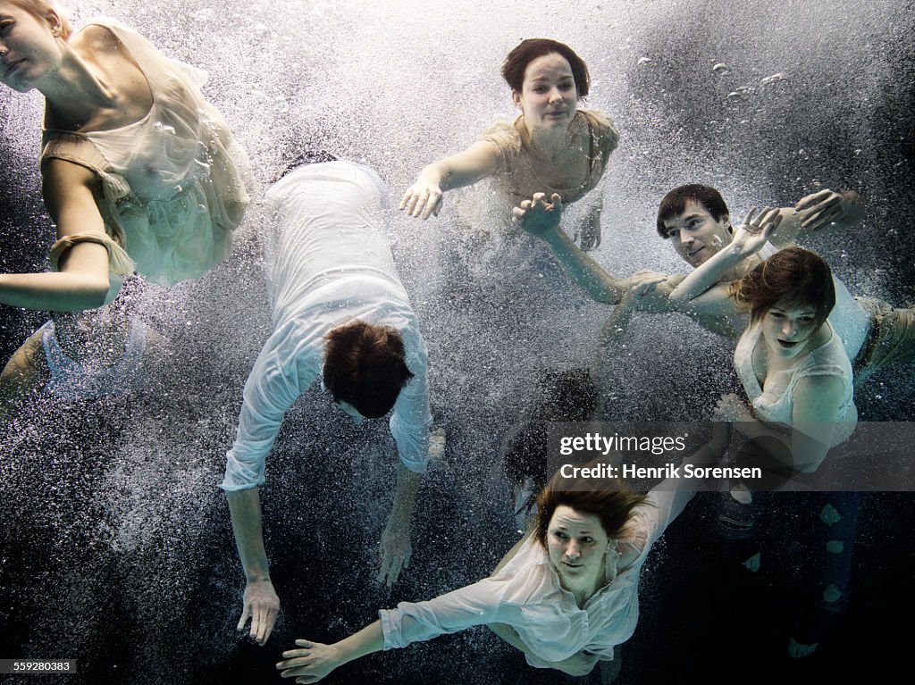 Group of people under water