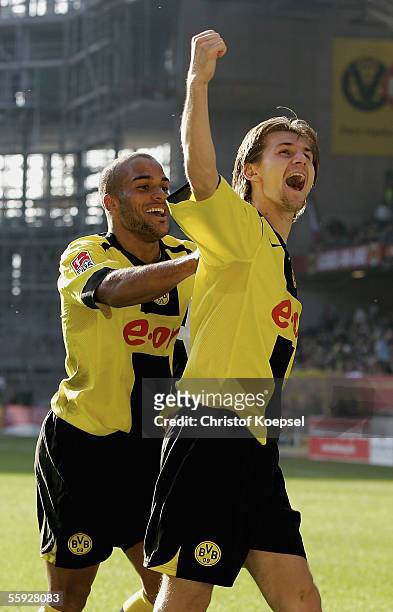 Ebi Smolarek of Dortmund celebrates his third goal with David Odonkor during the Bundesliga match between 1.FC Kaiserslautern and Borussia Dortmund...