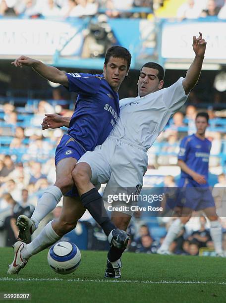 Joe Cole of Chelsea is tackled by Tal Ben Haim of Bolton Wanderers during the Barclays Premiership match between Chelsea and Bolton Wanderers at...