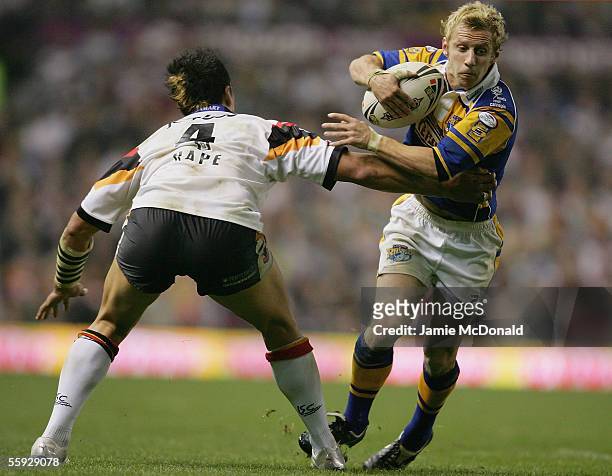 Rob Burrow of Leeds goes past Shontane Hape of Bradford during the Engage Super league Grand Final between Leeds Rhinos and Bradford Bulls at Old...