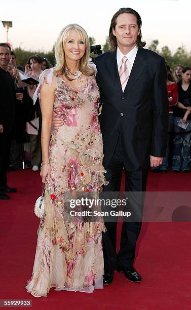 Television hostess Frauke Ludowig and her husband Kai Roeffen arrive at the German Television Awards at the Coloneum on October 15, 2005 in Cologne,...