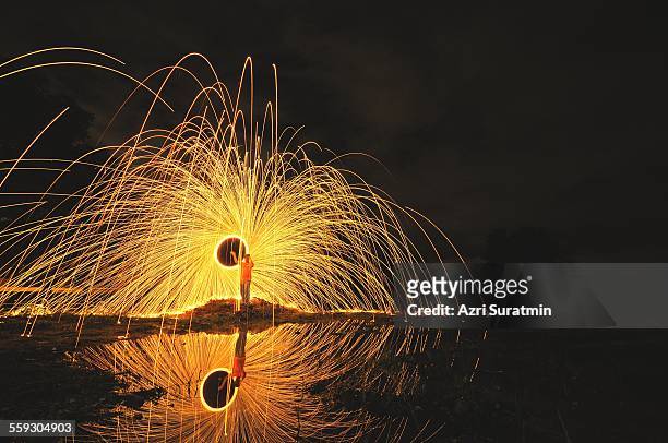 reflection - fire performer stock pictures, royalty-free photos & images