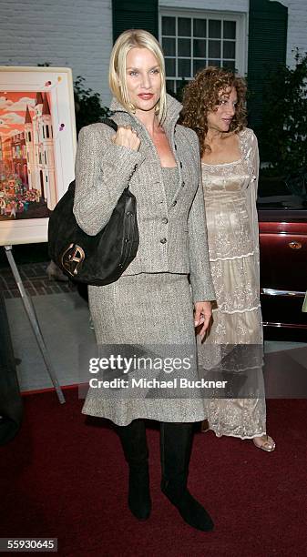 Actress Nicolette Sheridan arrives at the celebrity live and silent auction benefitting victims of Hurricane Katrina at a private residence on...