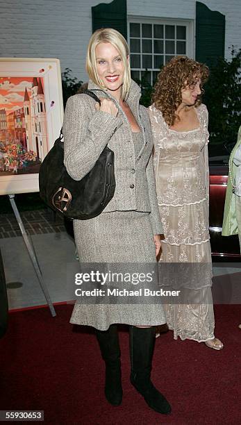 Actress Nicolette Sheridan arrives at the celebrity live and silent auction benefitting victims of Hurricane Katrina at a private residence on...