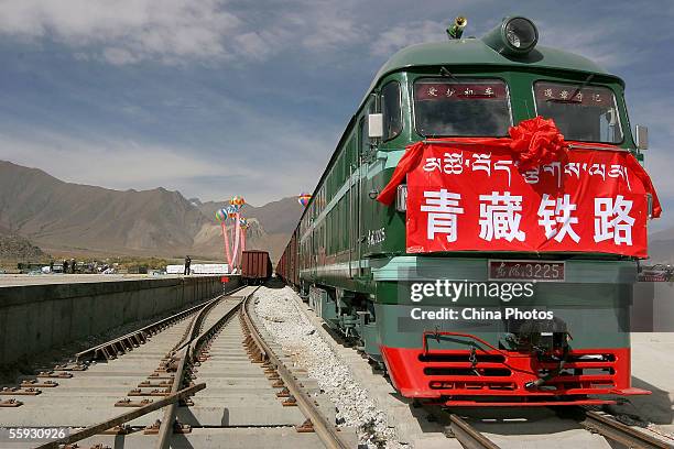 Train pulls into the Lhasa Railway Station to celebrate the completion of the Qinghai-Tibet Railway during a ceremony on October 15, 2005 in Lhasa of...