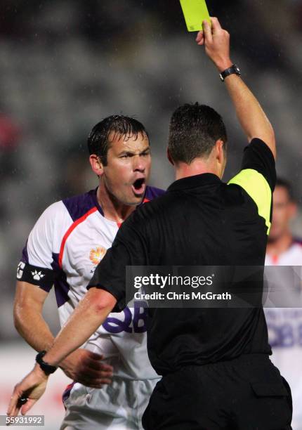 Jamie Harnwell of the Glory argues with referee Ben Williams after a team mate was yellow carded during the round eight Hyundai A-League match...