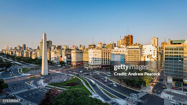 a city landmark, obelisk on ave 9 de julio - argentina fotografías e imágenes de stock