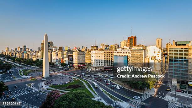 a city landmark, obelisk on ave 9 de julio - obelisk stockfoto's en -beelden