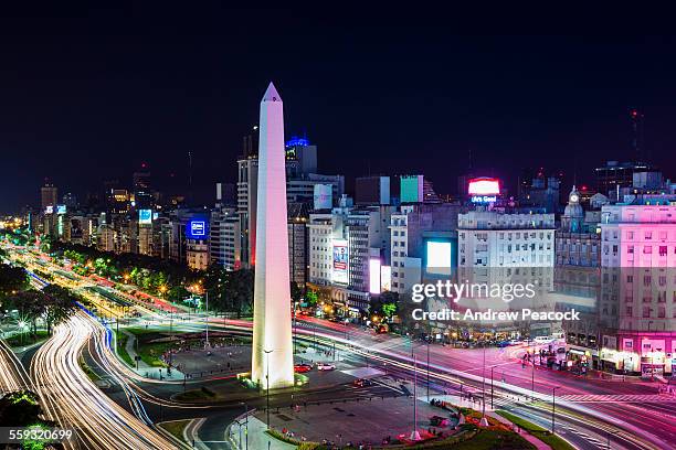 a city landmark, obelisk on ave 9 de julio, night - buenos aires night fotografías e imágenes de stock