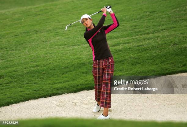 Michelle Wie makes a bunker shot on the third hole during the final round of the LPGA Samsung World Championship on October 16, 2005 at the Bighorn...