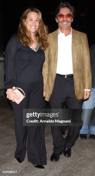 Geraldo Rivera and wife, Erica Levy, walk together towards a midtown restaurant October 16, 2005 in New York City.