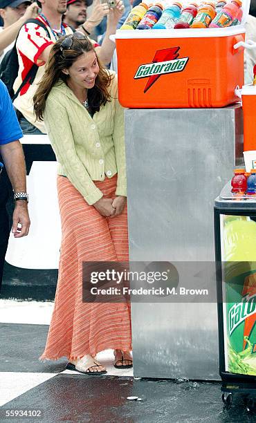 Actress Ashley Judd poses for photographers during the Toyota 400 Indy car race at the California Speedway on October 16, 2005 in Fontana, California.