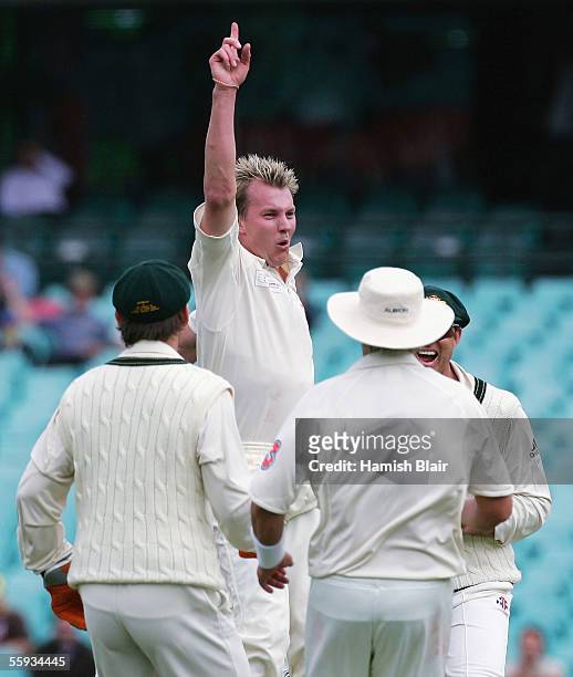 Brett Lee of Australia celebrates with team mates after taking the wicket of Inzamam-ul-Haq of the ICC World XI during day four of the Johnnie Walker...