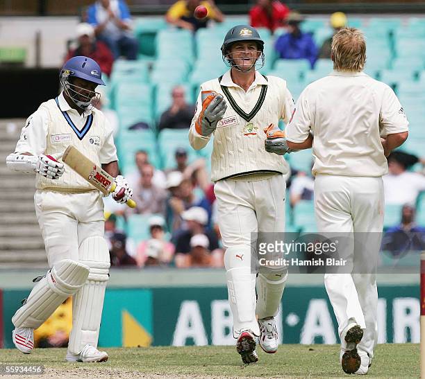 Adam Gilchrist and Shane Warne of Australia celebrates the wicket of Brian Lara of the ICC World XI during day four of the Johnnie Walker Super...