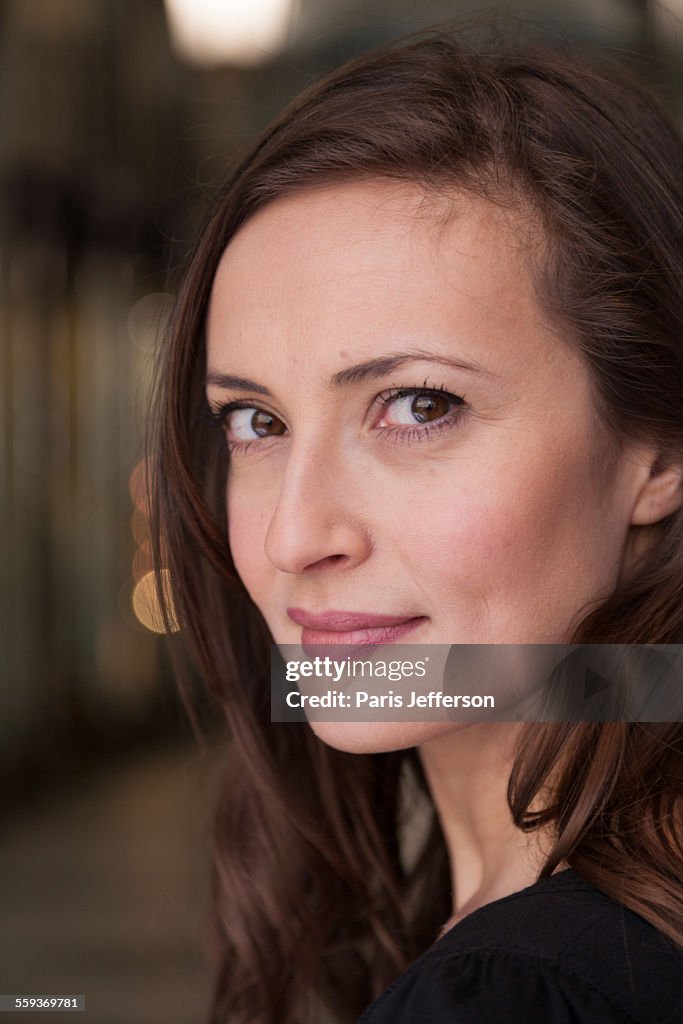 Beautiful Woman With A Knowing Smile High-Res Stock Photo - Getty Images