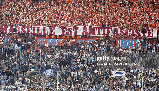 Marseille's supporters hold a banner "Marseille is antifascit" during the French L1 football match Olympique de Marseille vs Paris Saint-Germain at...