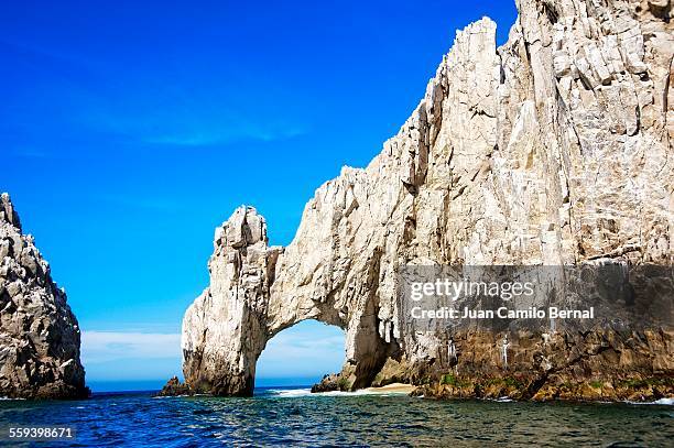 the famous arch in cabo san lucas - baja california sur stock pictures, royalty-free photos & images