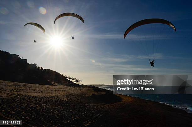 paraglider - canoa quebrada stock pictures, royalty-free photos & images