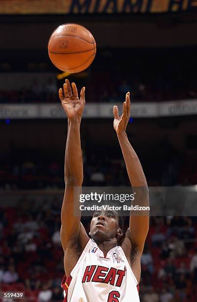 Guard Eddie Jones of the Miami Heat shoots a free throw during the NBA game against the New Jersey Nets at American Airlines Arena in Miami, Florida....