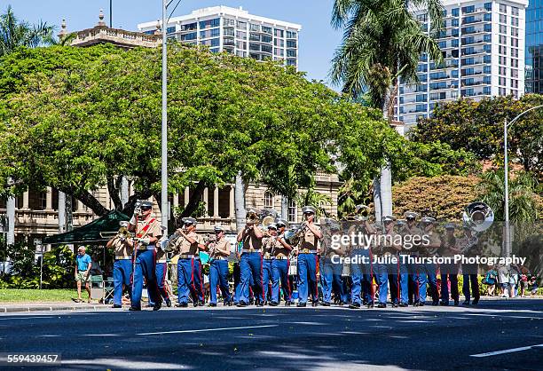 Marine Corps Pacific Fleet Band in military uniform, marching and playing in the local downtown annual King Kamehameha Day Parade in Honolulu, Hawaii...