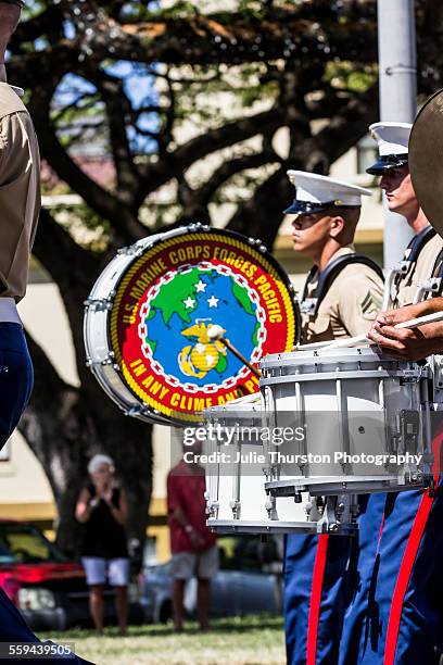 Marine Corps Pacific Fleet Band In Military uniform, marching and playing drums in the annual downtown local King Kamehameha Day Parade in Honolulu,...