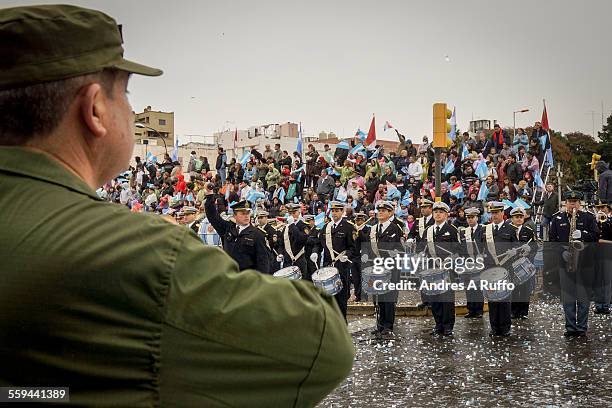 Overview of a group of people belonging to the Police Band Musical Cordoba Street "Rosario de Santa Fe" the city of Cordoba, Argentina, on the...
