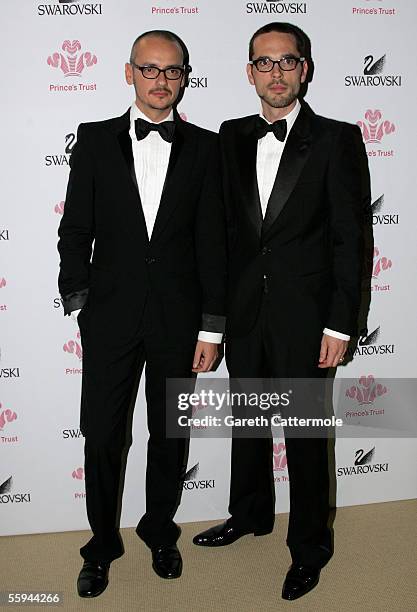 Designers Viktor Horsting and Rolf Snoeren pose for a picture backstage at the Swarovski Fashion Rocks for The Prince's Trust event at the Grimaldi...