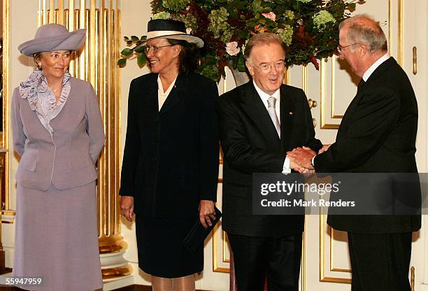 Queen Paola, Mrs Maria Jose Ritta, President Sampaio and King Albert pose for the official photo at the Royal Palace on October 18, 2005 in Brussels....