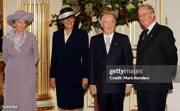Queen Paola, Mrs Maria Jose Ritta, President Sampaio and King Albert pose for the official photo at the Royal Palace on October 18, 2005 in Brussels....