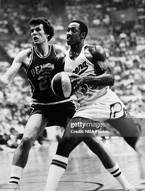 George McGinnis of the Indiana Pacers drives to the basket against the Denver Nuggets during an NBA game circa 1980 in Indianapolis, Indiana. NOTE TO...