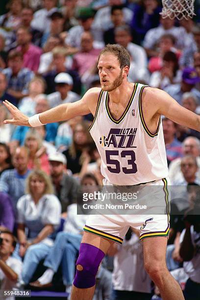 Mark Eaton of the Utah Jazz plays defense during an NBA game circa 1991 at the Delta Center in Salt Lake City, Utah. NOTE TO USER: User expressly...