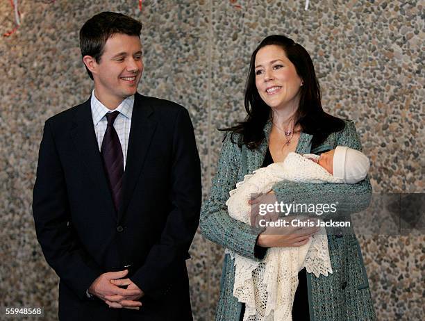 Prince Frederik of Denmark and Princess Mary of Denmark pose with their new baby son as they leave Copenhagen University Hospital on October 18, 2005...