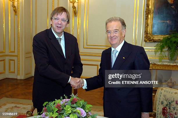 Portuguese President Jorge Sampaio shakes hands with Belgian Prime Minister Guy Verhofstadt prior to a bilateral meeting, 18 October 2005. Portuguese...