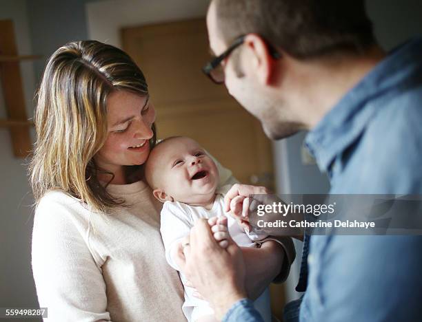 parents and their 3 months old baby boy - infant photos et images de collection