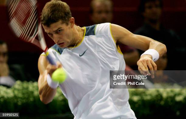 Max Mirnyi of Belarus plays a forehand against Juan Carlos Ferrero of Spain during the first round of the ATP Madrid Masters at the Nuevo Rockodromo...