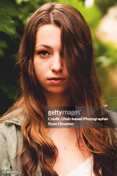 brown-eyed brunette teenage girl - brown eyed girls stock pictures, royalty-free photos & images