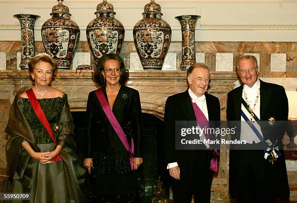 Queen Paola, Maria Jose Ritta, Portuguese President Jorge Sampaio and King Albert pose before the gala dinner at Laeken Castle October 18, 2005 in...