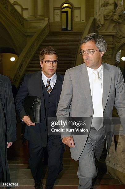 Former referee Robert Hoyzer and his lawyer Dr. Thomas Hermes arrive to the court room as the football betting scandal hearing against Hoyzer begins...