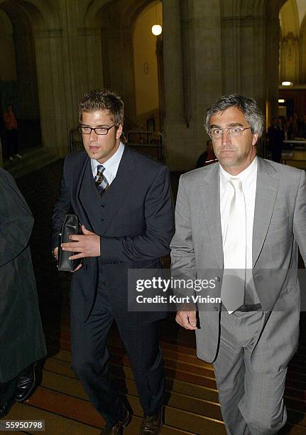 Former referee Robert Hoyzer and his lawyer Dr. Thomas Hermes arrive to the court room as the football betting scandal hearing against Hoyzer begins...