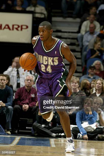 Desmond Mason of the Milwaukee Bucks brings the ball upcourt during the preseason game against the Minnesota Timberwolves on October 12, 2005 at the...