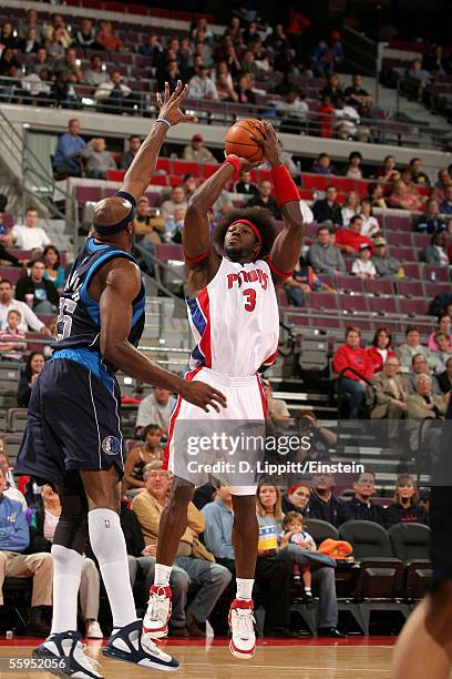 Ben Wallace of the Detroit Pistons shoots over Erick Dampier of the Dallas Mavericks in a preseason game on October 18, 2005 at the Palace of Auburn...