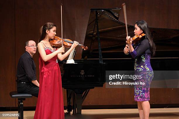 The violinist Sarah Chang teaching master class at the Juilliard School on Tuesday afternoon, March 26, 2015.This image:From left, Evan Solomon,...