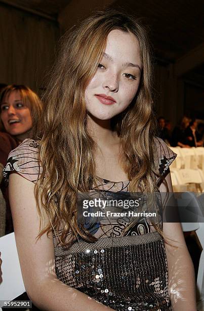 Actress Devon Aoki poses in the front row at the Ya-Ya Spring 2006 show during Mercedes-Benz Fashion Week at Smashbox Studios on October 18, 2005 in...