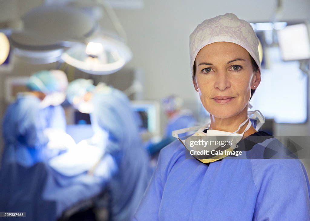 Portrait of confident surgeon in operating room